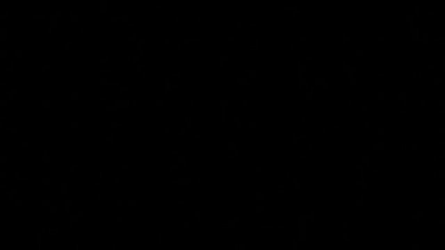 Young female blonde caucasian dancer dancing in front of studio light. Closeup shot.