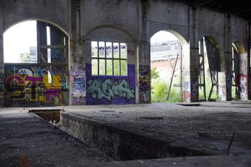 Old abandoned train repair factory (Reichsbahnausbesserungswerk / altes Bahnhofsgebäude) in...