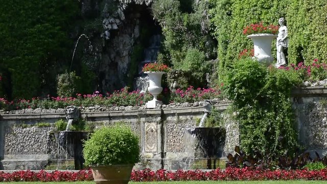 The Theatre of Water of Villa Reale in Marlia, with stone fountains, grotto,statues and beautiful roses flower beds.