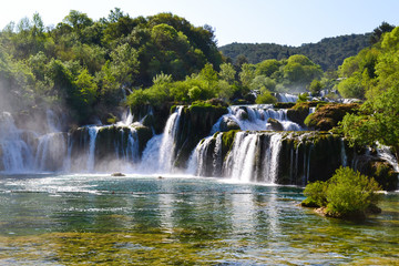 Fototapeta na wymiar Flowing water of the Waterfalls Krka, National Park, Dalmatia, Croatia