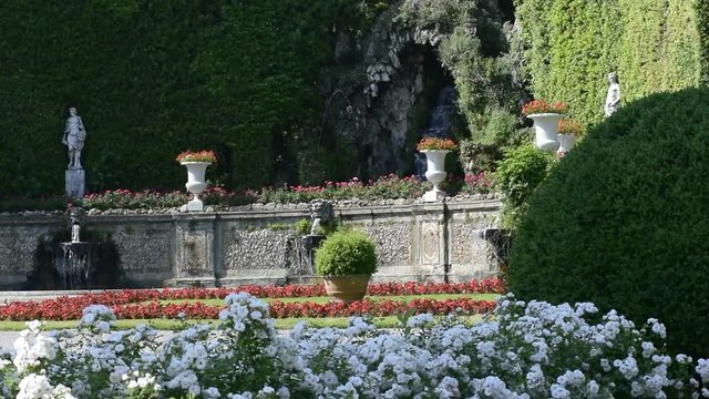 The Theatre of Water of Villa Reale in Marlia, with stone fountains, grotto,statues and beautiful roses flower beds.