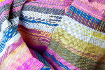 Close Up Colorful Texture of Linen that Produce by Weaving machine and Thai traditional Linen. Weaving loom for homemade Linen textile
