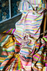Close Up Colorful Texture of Linen that Produce by Weaving machine and Thai traditional Linen. Weaving loom for homemade Linen textile
