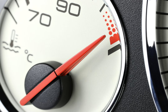 temperature gauge in car dashboard - hot