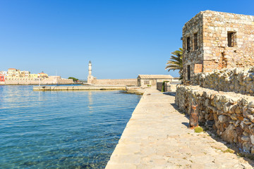 The venetian harbor of Chania with the lighthouse in the historical port on the island of Crete © ksl