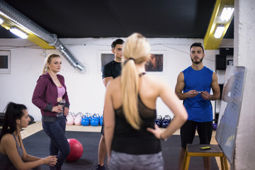 athletes getting instructions from trainer