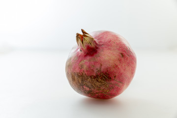 Pomegranate with cracks on the skin