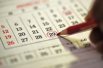 Twenty ninth Day of the month marked with marked in the calendar with red pencil