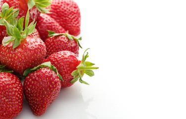 Fresh natural strawberries on white background with place for text. Copyspace