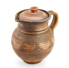 clay ethnic dishes on white background