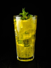Ice lemonade with mint and lemon in a Casablanca glass.