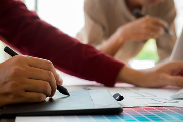 Web designer meeting  planning application for mobile phone. Design Online Technology Content, Ideas Proposal Strategy Tactics Vision Design Concept