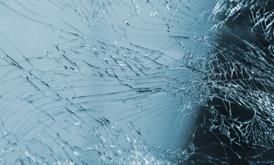 Broken smartphone screen on white background. Selective focus.