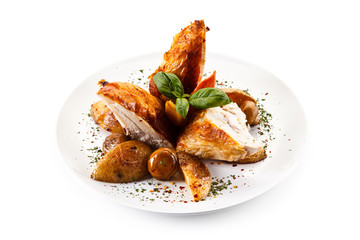 Grilled chicken breast with baked potatoes white background
