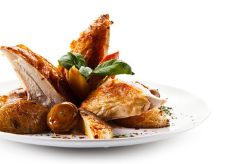 Grilled chicken breast with baked potatoes white background