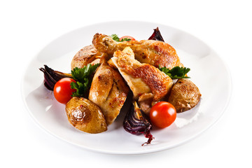 Grilled drumsticks with baked potatoes white background