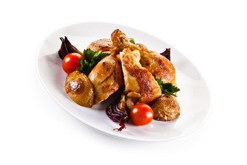 Grilled drumsticks with baked potatoes white background