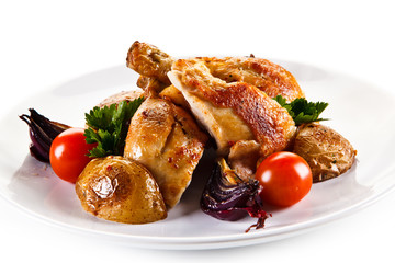 Grilled drumsticks with baked potatoes white background