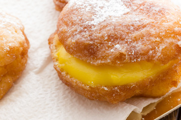 Handmade krapfen filled with pastry cream