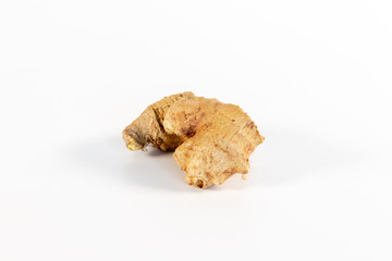 Piece of ginger isolated in white background