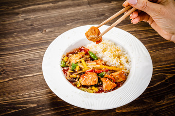 Chicken meat with rice and vegetables