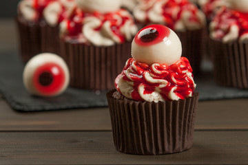 Halloween Cupcakes With Eyeballs. Blood Topping. Home Baked.