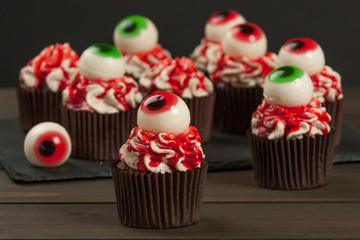 Halloween Cupcakes With Eyeballs. Blood Topping. Home Baked.