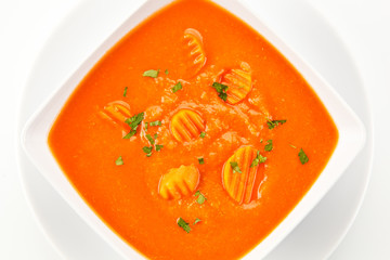 Carrot soup on white background