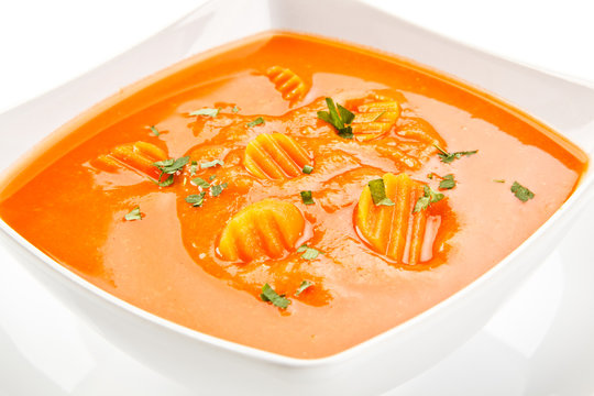 Carrot soup on white background