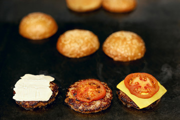 Cooking Burgers.  Meat And Buns Roasting On Grill 