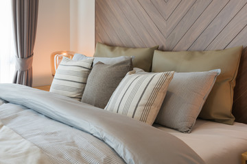 set of pillows on bed