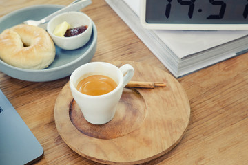 coffee break  cup of espresso on working business wood table.