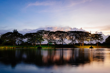 Fototapeta na wymiar A small lake in summer , at sunset