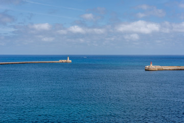 Photo of Mediterranean Sea, view from Valletta, Malta. Blue cloudy sky as background.