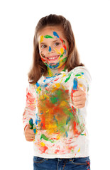 Funny girl with hands and face full of paint