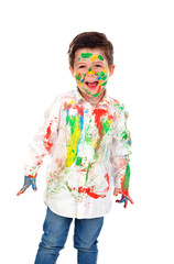 Funny boy with hands and face full of paint