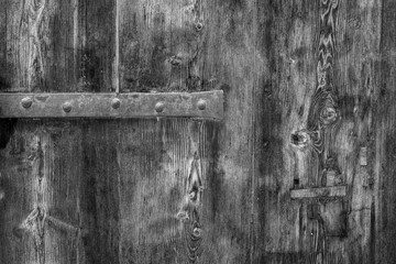Photo of Old rustic wood texture with metal parts, perfect for a background