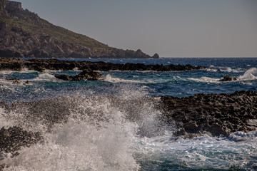 Photo of Sea water beating against rock, Cirkewwa, Malta