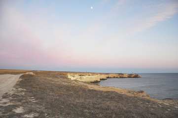 Fototapeta na wymiar A quiet evening on the Cape near the sea in Crimea
