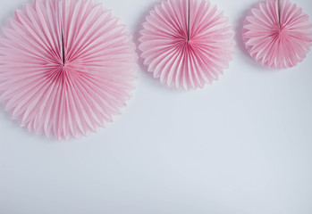 Pink japanese paper fans and white background