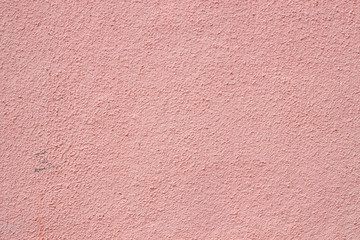 Fototapeta premium pale pink plastered concrete wall, texture, background