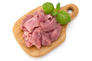 Raw chopped beef meat pieces isolated om white background cut out.