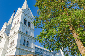 Majestic white Church of the Heart of Jesus in Slobodka, Belarus. The combination of Gothic and Roman style