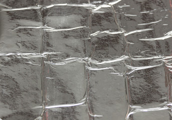 silver mirrored background with curved stripes