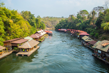 The houseboat and floating restaurant at Sai Yok Yai waterfall , Kanchanaburi in thailand