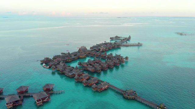 Aerial view of the floating resorts of MABUL. One of the most beautiful dive spots in the world. Shot in 4k.