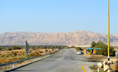 Road among beige mountains
