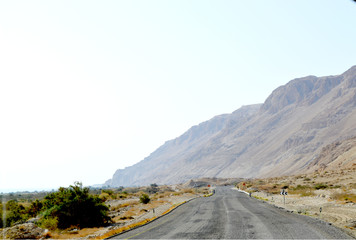 Road among beige mountains