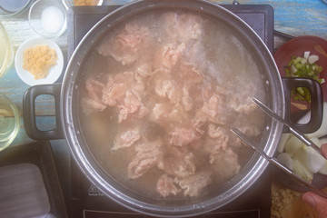 Chef scald beef with hot water  for cooking
