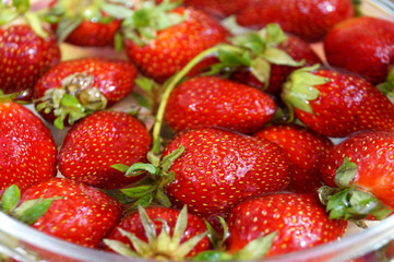 Fresh strawberry in capacity with water